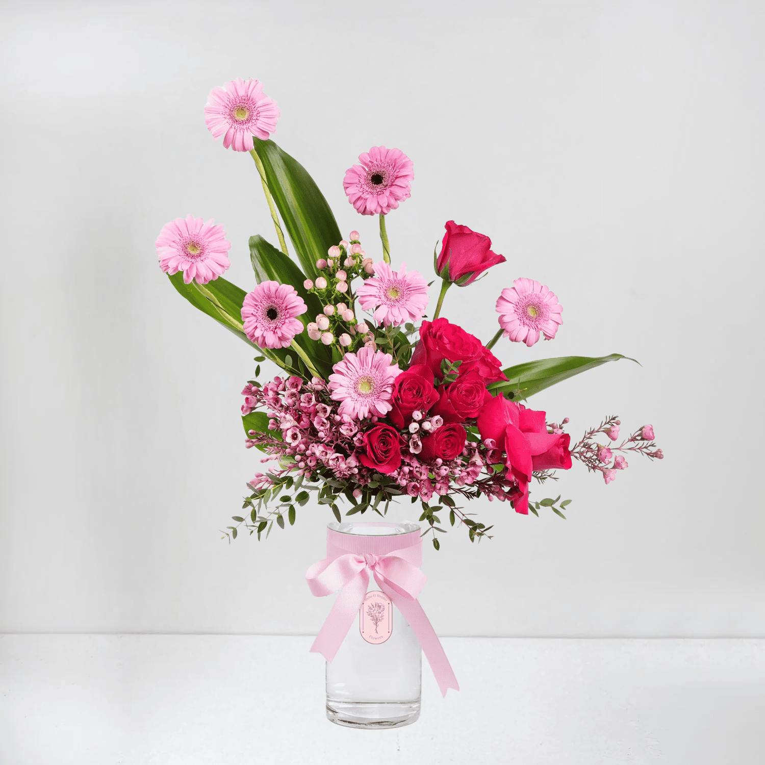 Pink Gerberas, Red Roses in Glass Vase