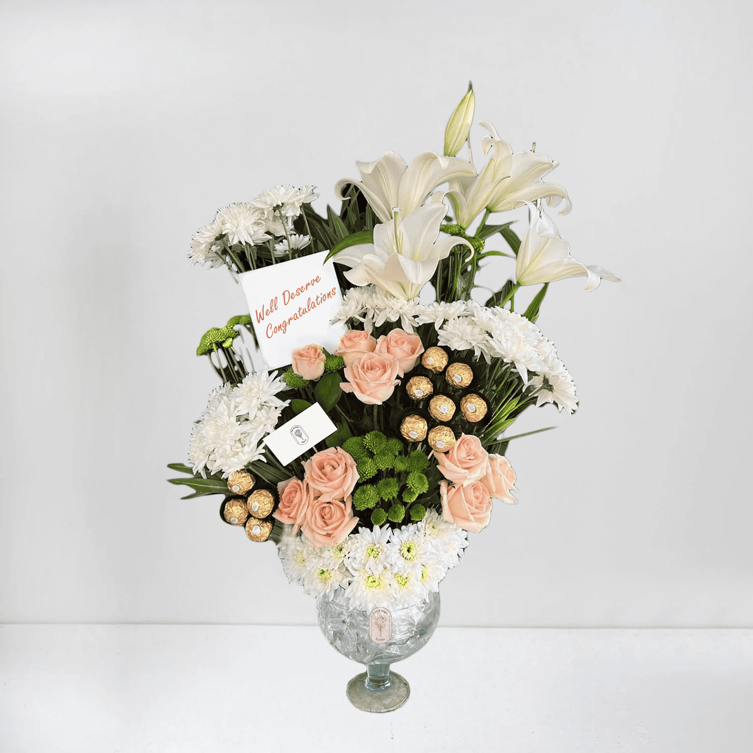 Elegant Peach Roses, White Lilies & Ferrero Chocolates