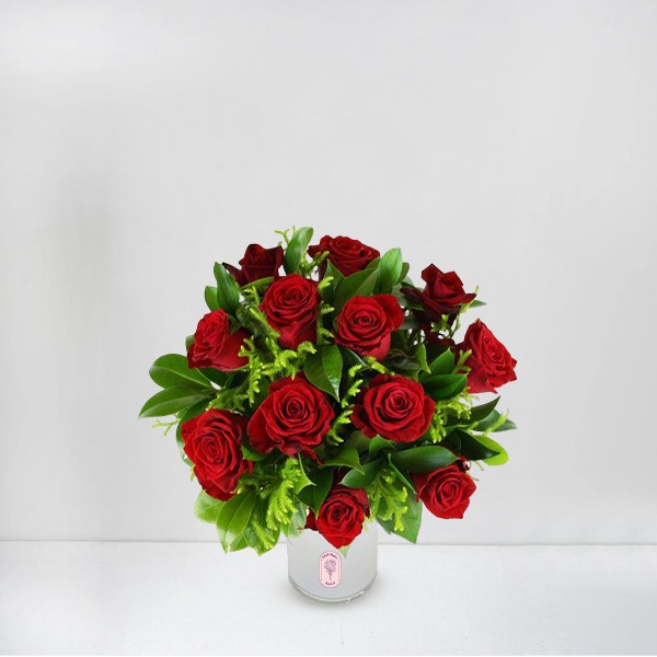 Elegant Fresh Red Roses in a Modern White Vase